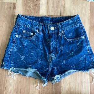 H&M Mid-High Rise Jean Short with LOVE shuttle print